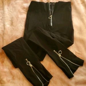 Full-length black zipper pants